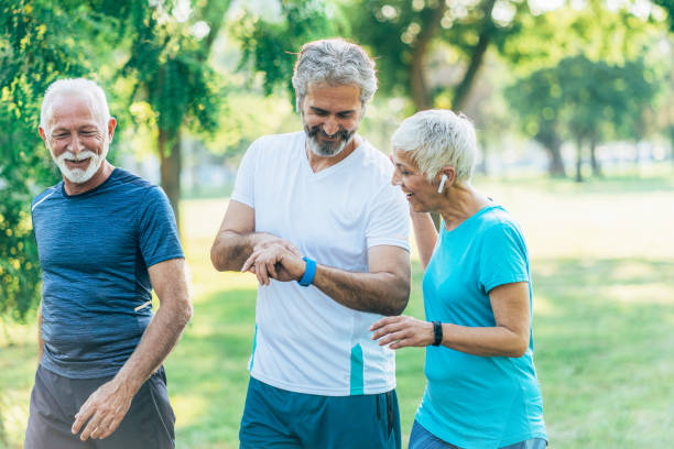 istock Three senior friends jogging together 1490452604