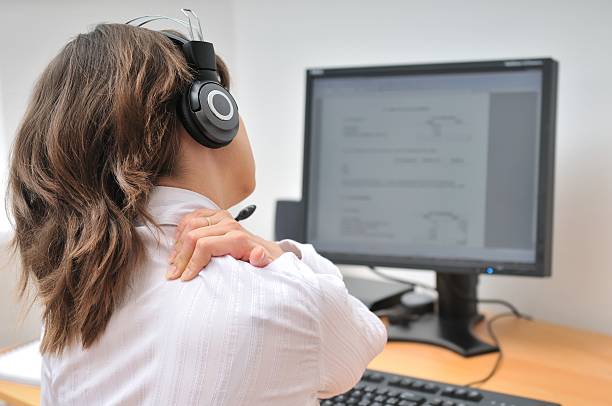 istock Call center employee with neck pain 149045440