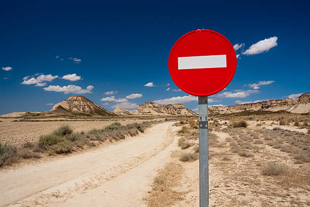 Traffic sign on a desert road stock photo