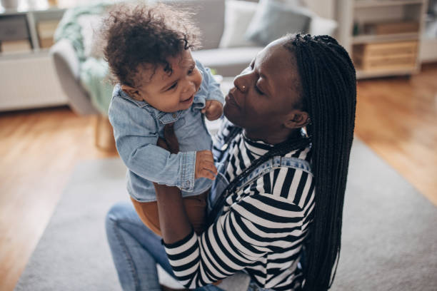 istock Mother holding her baby boy 1490456585
