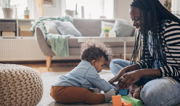 istock Mom playing with baby 1490456616