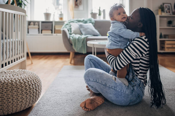 istock Mother holding her baby boy 1490456769