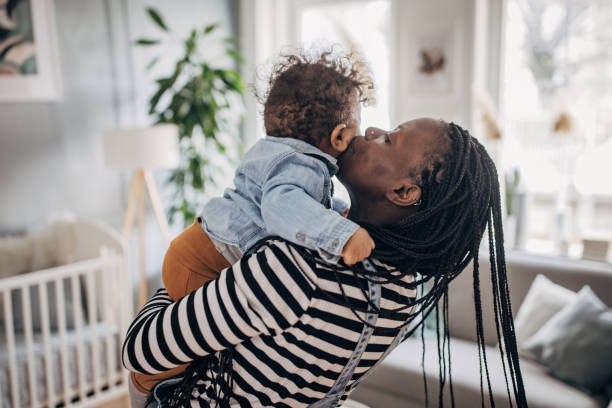 istock Mom holding her baby boy 1490456867