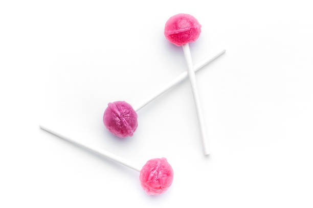 istock Sweet lollipops on white background 1490458985