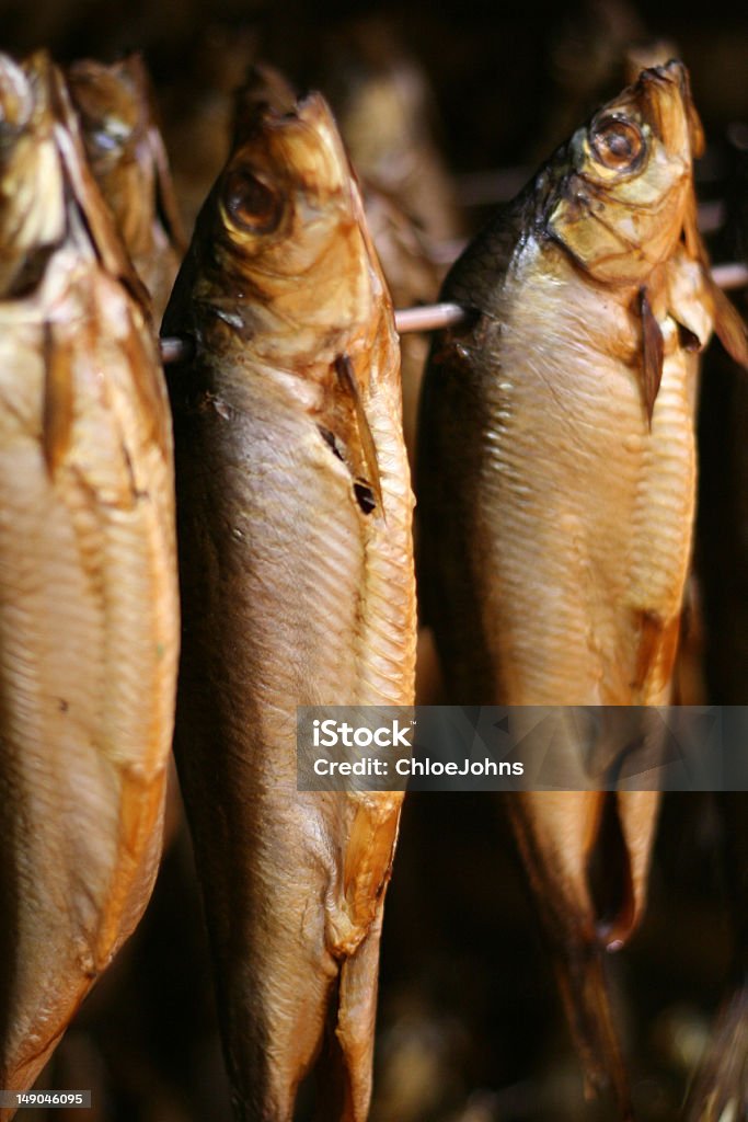 Smoked Fish smoked fish in a smoking hut Curing Food Stock Photo