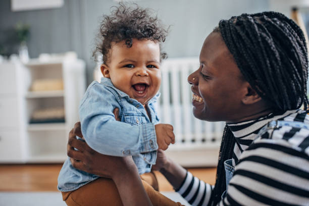 istock Happy mother with baby 1490466763
