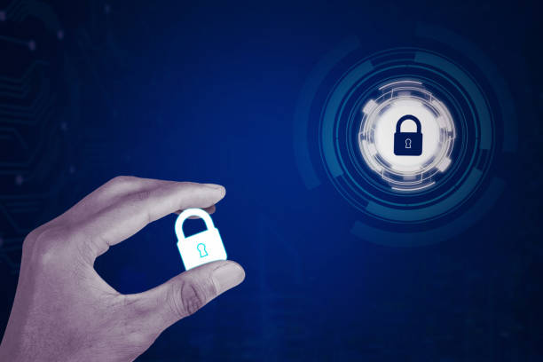 istock Hand holding a virtual lock with futuristic background 1490466937