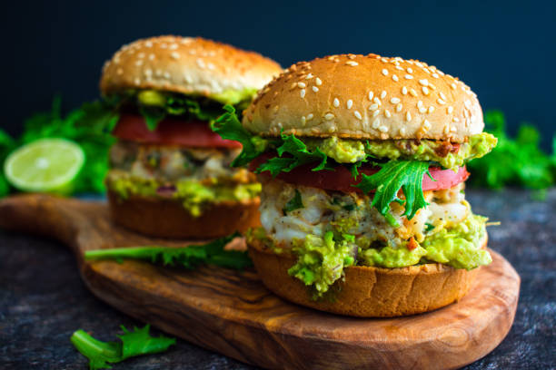 Shrimp Burgers with Cilantro and Guacamole on Sesame Seed Buns