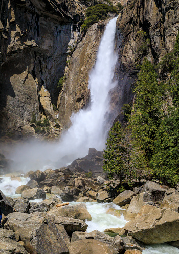 Close up of Lower Yosemite Falls full of snowmelt water in the spring in Yosemite National Park, Sierra Nevada mountain range in California, USA