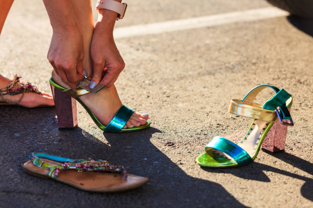 istock Girl changing shoes. 1490475827