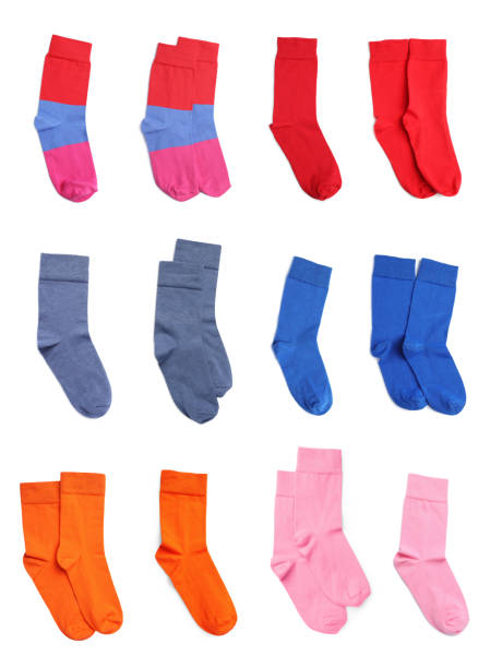 istock Set with pairs of different color socks on white background, top view 1490476817