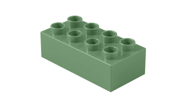 istock Turf Green Plastic Toy Block Isolated on a White Background. 1490479783
