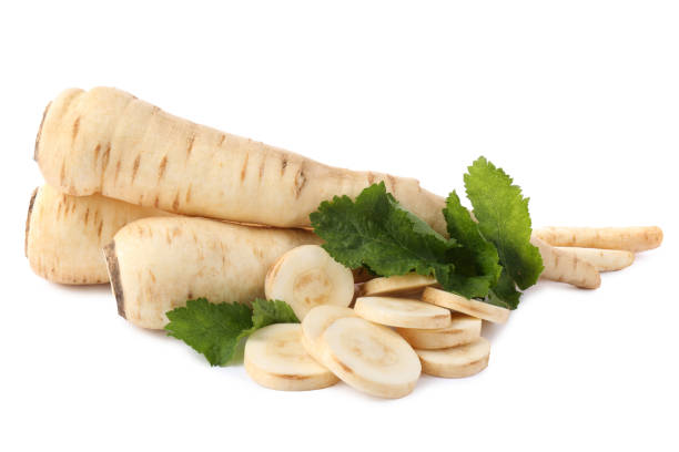 istock Tasty fresh ripe parsnips on white background 1490480094