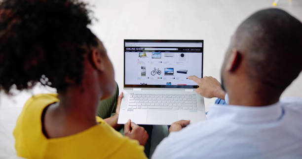 istock Close-up Of A Couple Using Laptop 1490487311