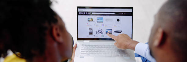 istock Close-up Of A Couple Using Laptop 1490487320