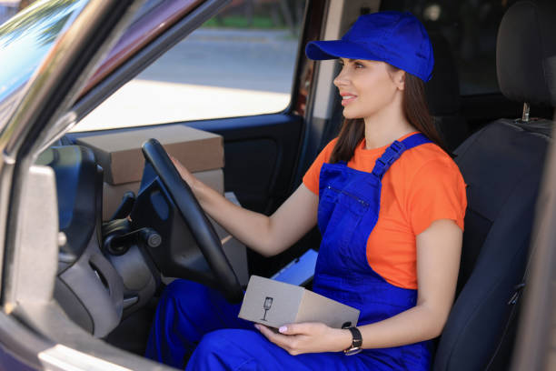 istock Courier with parcels in car. Delivery service 1490487454