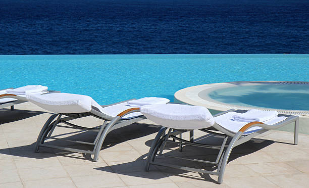 istock luxury outdoor swimming pool chair 149048774