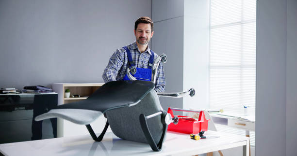 istock Office Chair Assembling And Repair. Man Working 1490492274