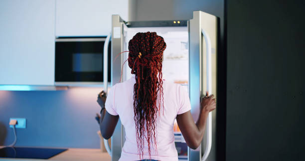 istock Young Woman Looking At Food 1490496787