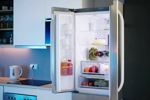 istock Open Refrigerator Full Of Juice And Fresh Vegetables 1490497416