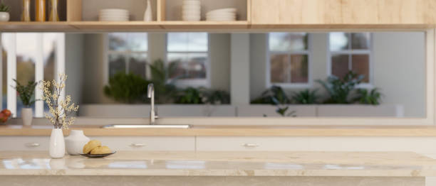 istock Copy space on beautiful marble kitchen countertop with window backsplash, sink 1490505649