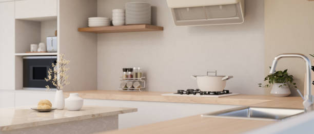 istock Minimalist kitchen interior design with minimal wood kitchen countertop, sink, stove 1490505650