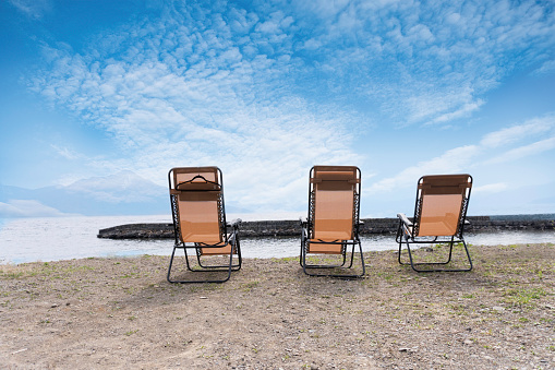 Lake Shikotsu and relax chair in Hokkaido