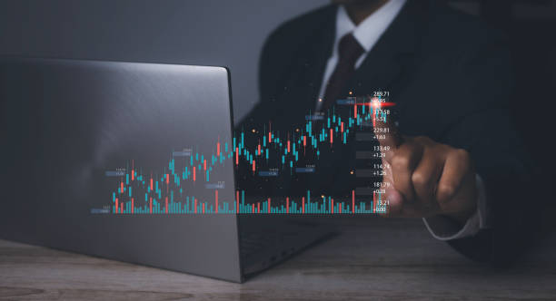 istock Stock market graph with man working stock trading computer screen background. 1490507919