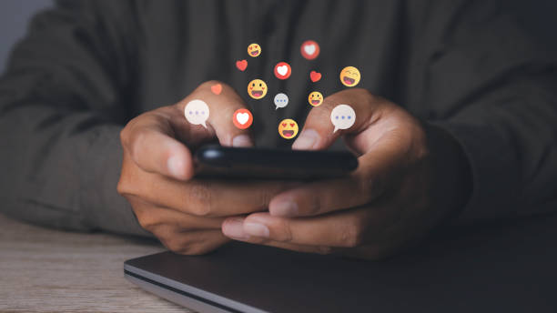 istock man using smartphone with social media to click like and love icon on internet post. 1490507921