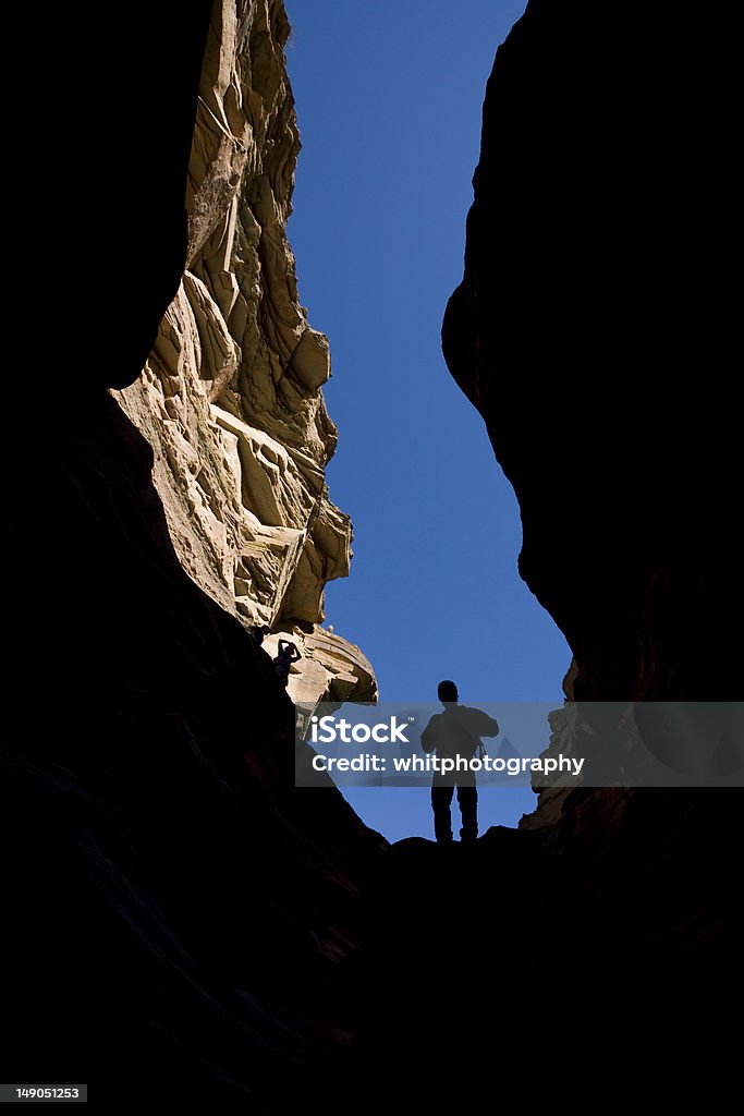 Person standing in canyon. Grand Canyon National Park Stock Photo