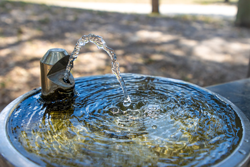 High speed shot of water coming out of a water fountain.