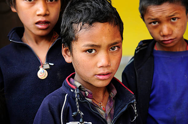istock Three Tibetan Himalayas mountain kids before becoming monks 149051803