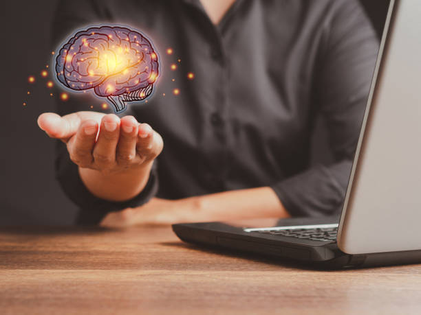 istock Brain on the palm. Artificial Intelligence, AI Technology. Mental health protection and care. 1490518859