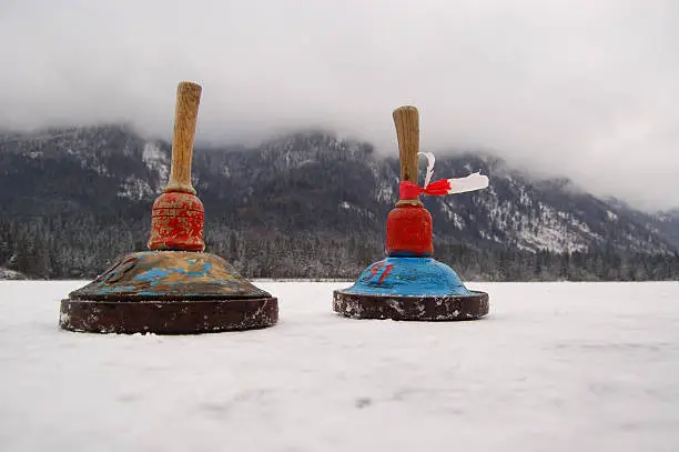 Two Curling Pins on Hintersee in Bavaria, Germany.