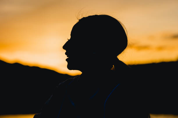 istock Female Portrait in Silhouette 1490527027