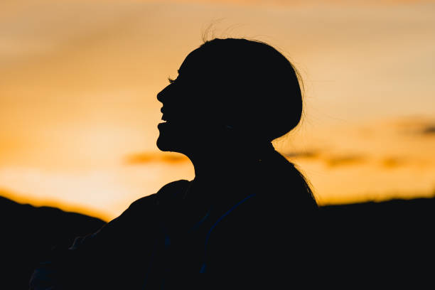 istock Female Portrait in Silhouette 1490527028
