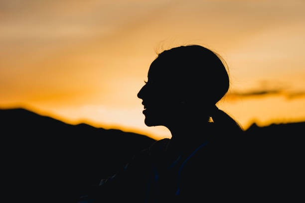 istock Female Portrait in Silhouette 1490527029