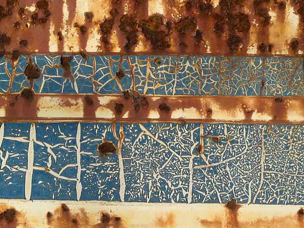 Rusty steel with blue and white paint stock photo