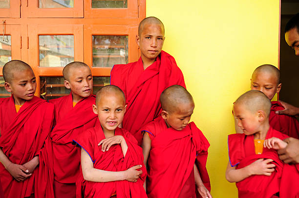 istock Little Tibetan monks standing in front of their classroom 149053989