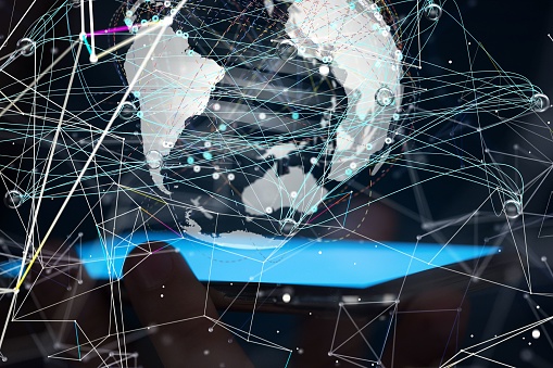 A man pointing his fingers to the digital planet with a graph displayed on the screen