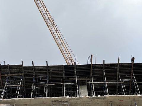 construction site with scaffolding and building