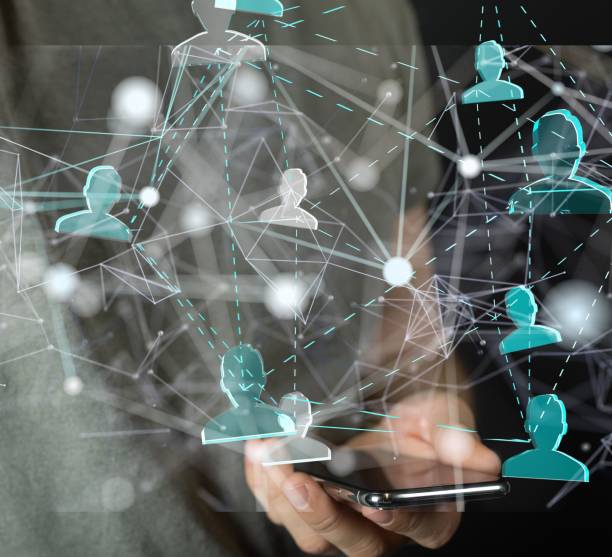 istock Modern individual is holding a smartphone and displaying a screen with various social media users 1490542763