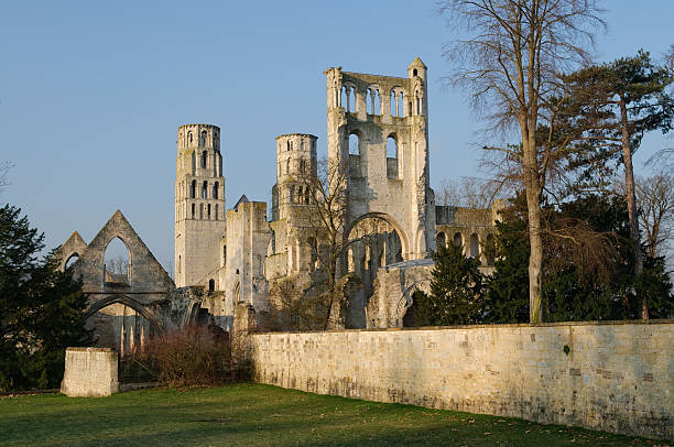 Abbey of Jumièges Founded in 654 AD the abbey of JumiAges in Normandy, France is one of the most beautiful ruins in France. abbey stock pictures, royalty-free photos & images