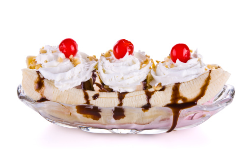 A banana split isolated on a white background.  This image also has a detailed clipping path.