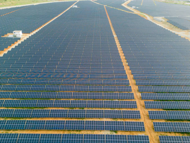istock Solar panels in aerial view 1490547856