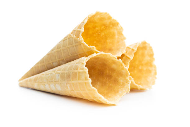 istock Empty wafer cone. Sweet ice cream cornet isolated on white background. 1490553904