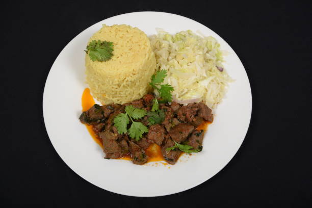 istock Fried Liver served with rice and vegetables 1490554957