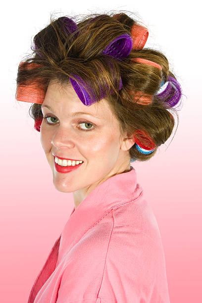istock Pretty lady with curlers in her hair 149055715