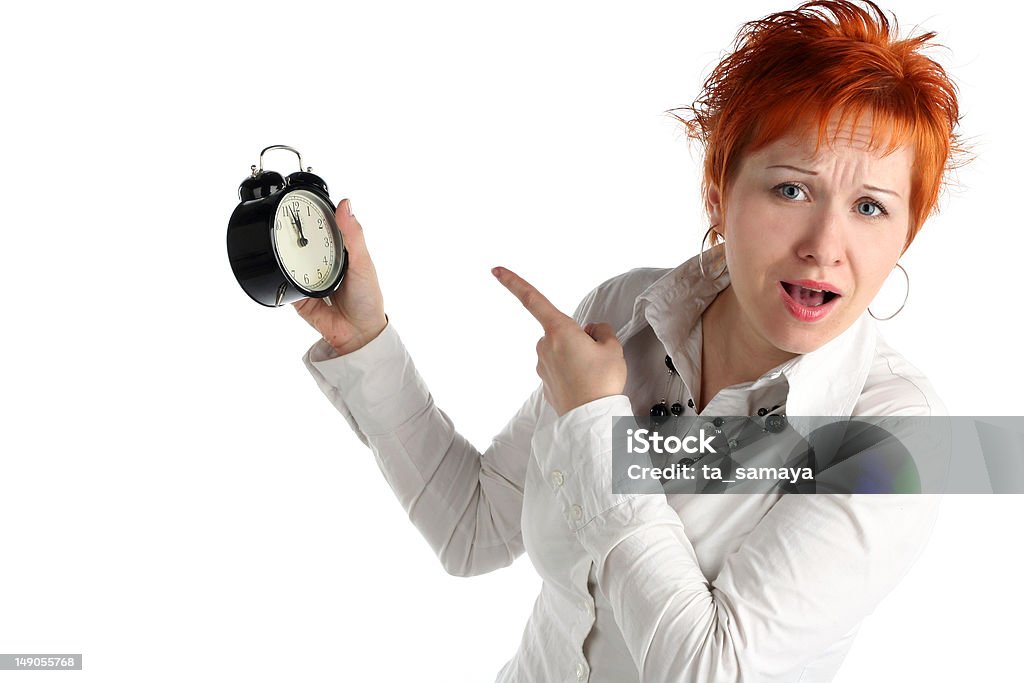Business woman with clock. Time is over! Deadline concept Adult Stock Photo