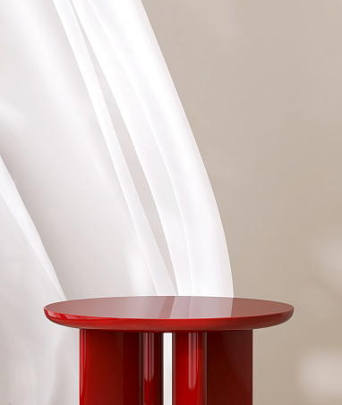 Empty modern glossy red round podium side table, soft white blowing drapery curtain in sunlight on beige wall for luxury cosmetic, skincare, beauty, body care, treatment, fashion product display background 3D